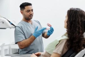 dental technician ensuring precision denture repair